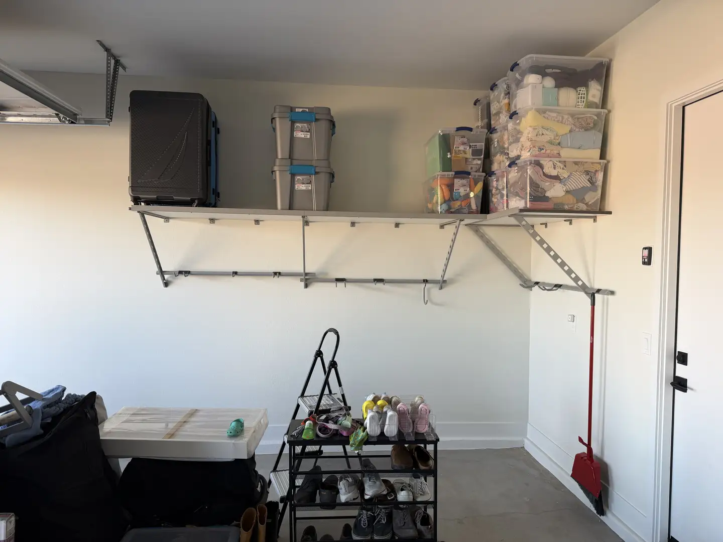 Queen Creek Garage Maximizes High Ceilings with Overhead Storage