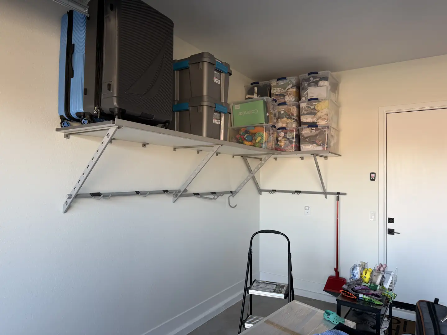 Queen Creek Garage Maximizes High Ceilings with Overhead Storage
